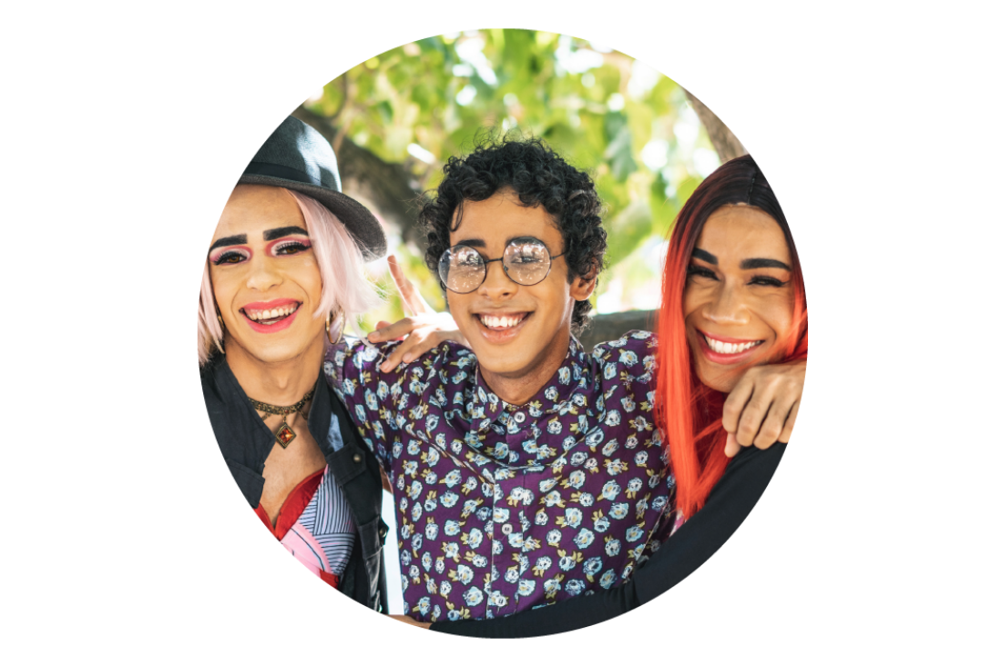 Image of adolescents smiling with their arms over each other's shoulders.