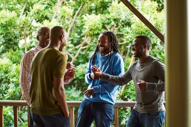 Image of black men laughing together