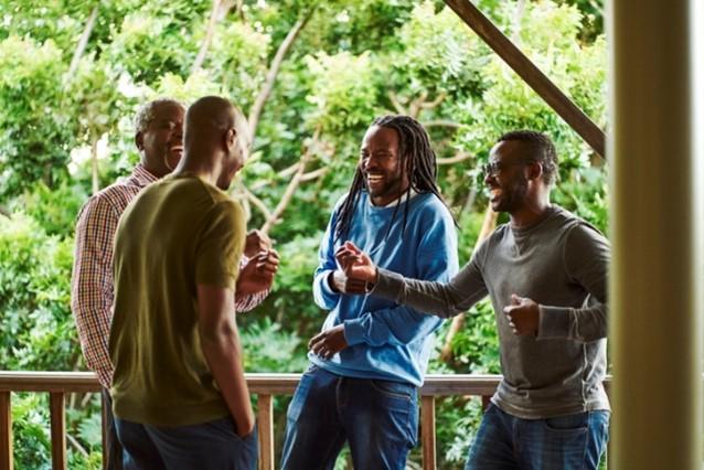 Image of black men laughing together